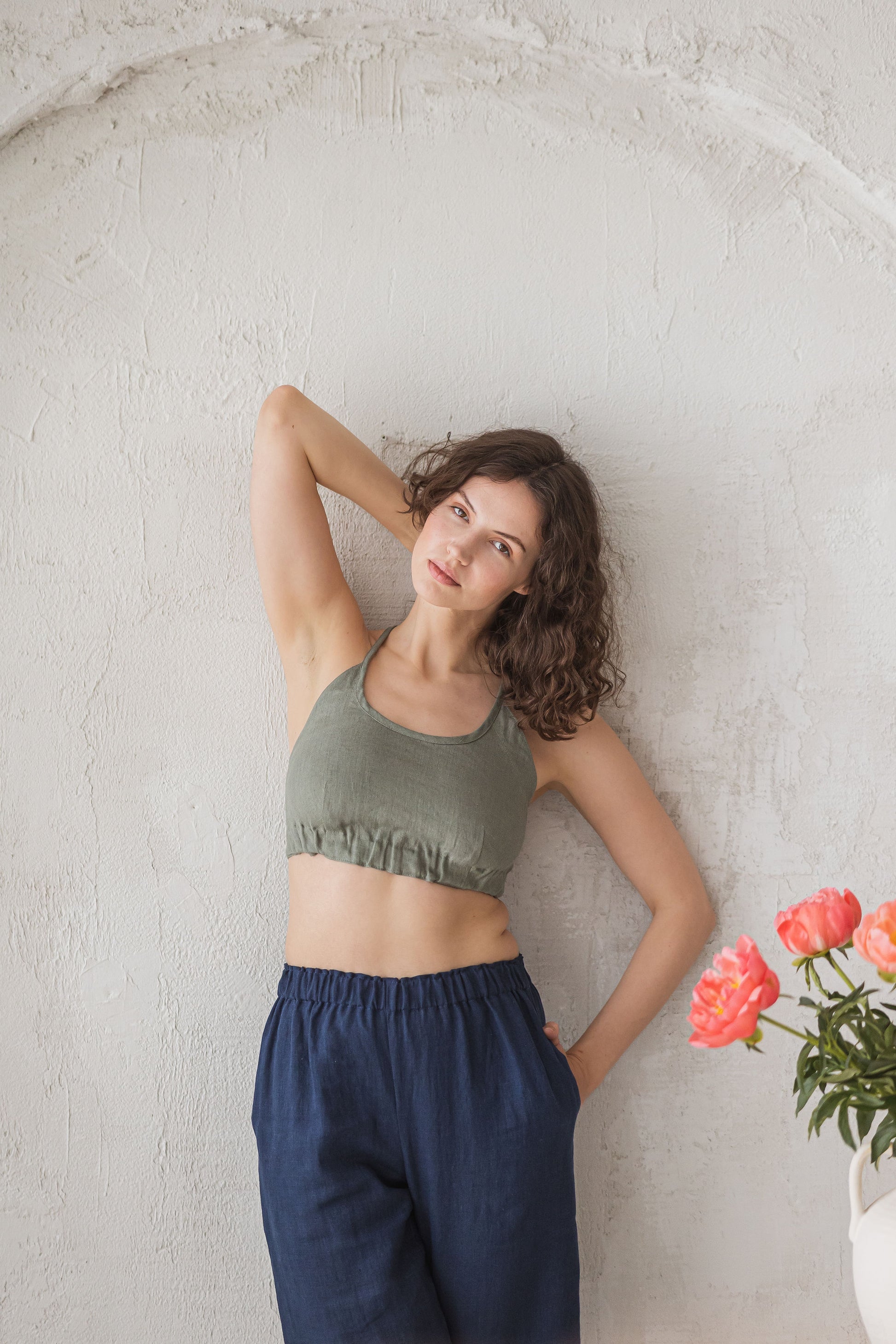 Linen elegnt bustier -bralette with crossed straps and buttons at  pback in pistachio color